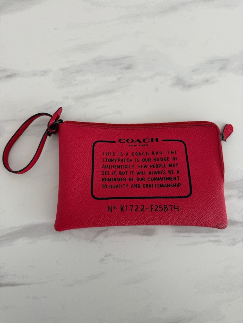 COACH Red Leather Wristlet Pouch with Black Storypatch Print